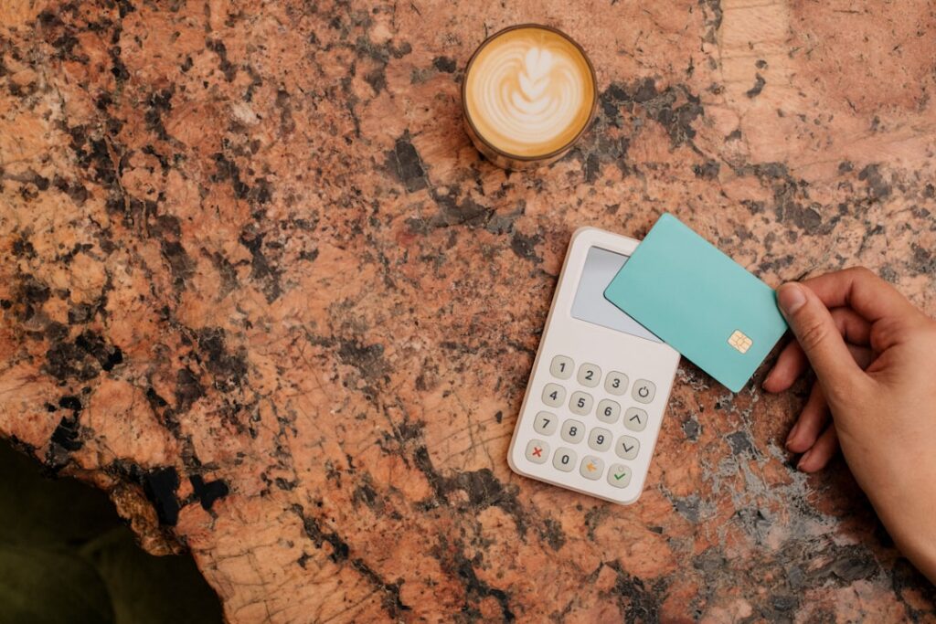 Close-up of a chargeback dispute letter next to a calculator and credit card