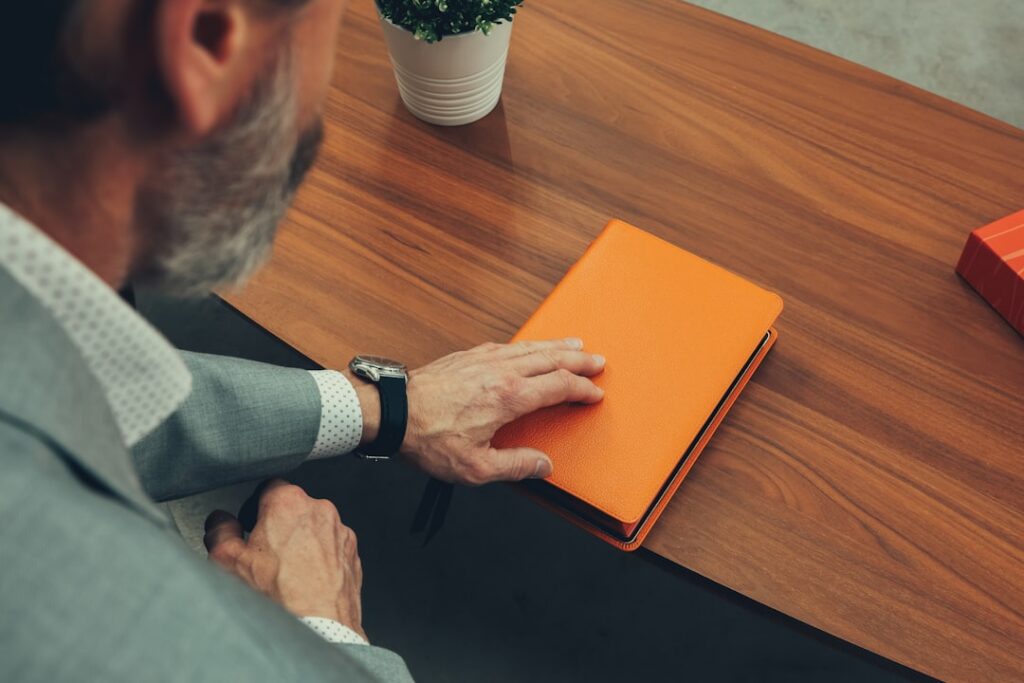 Business owner working through a checklist before signing a financing agreement