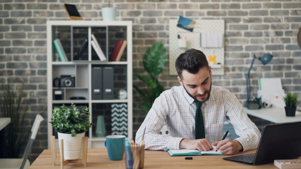 Small business owner reviewing a merchant cash advance contract with an attorney