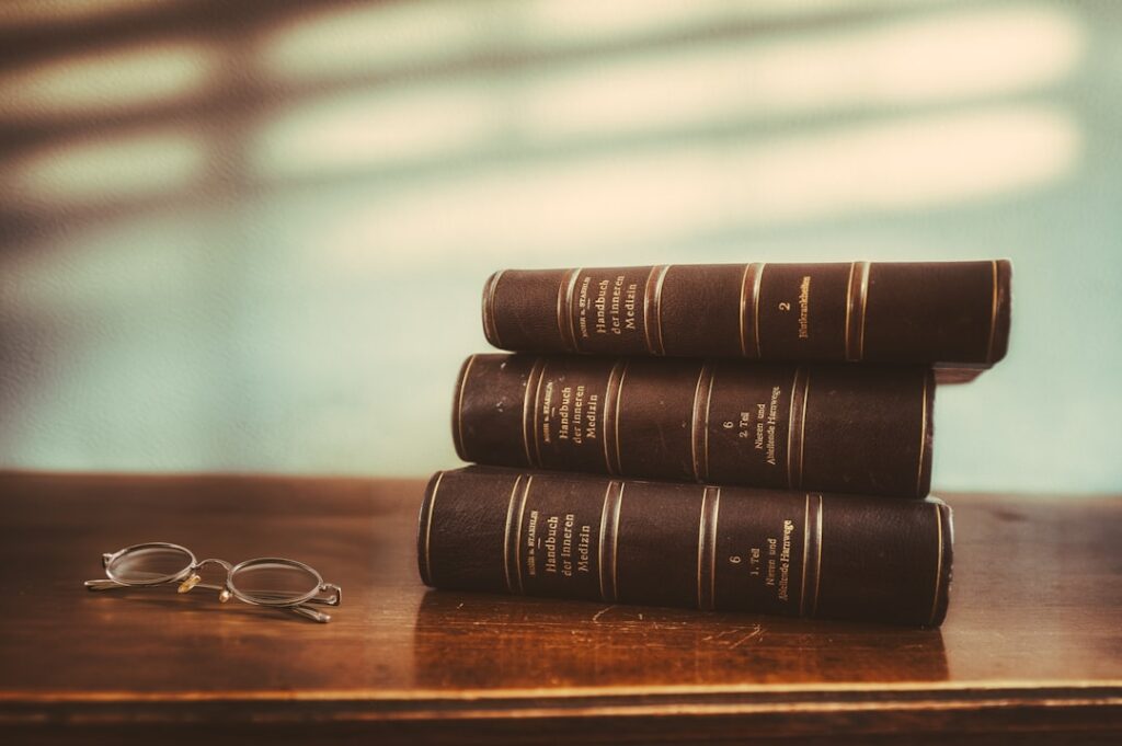 Gavel resting on law books on a desk, representing legal protections