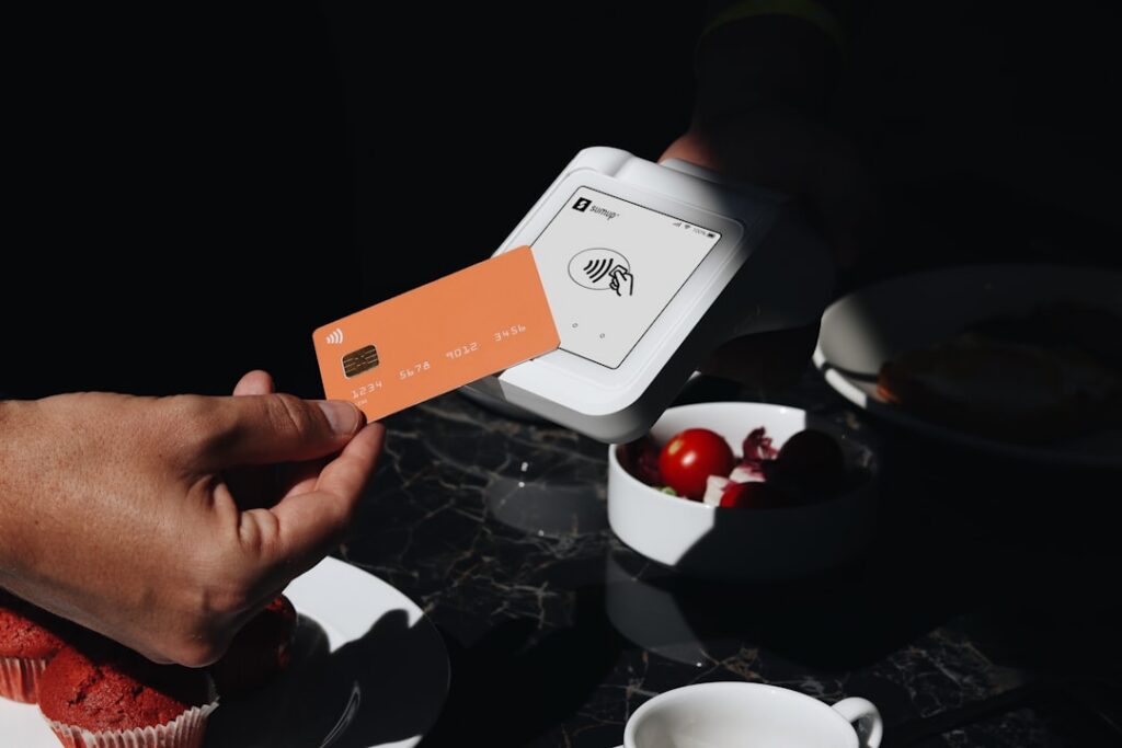 Close-up of a payment being handed over, symbolizing an upfront fee request