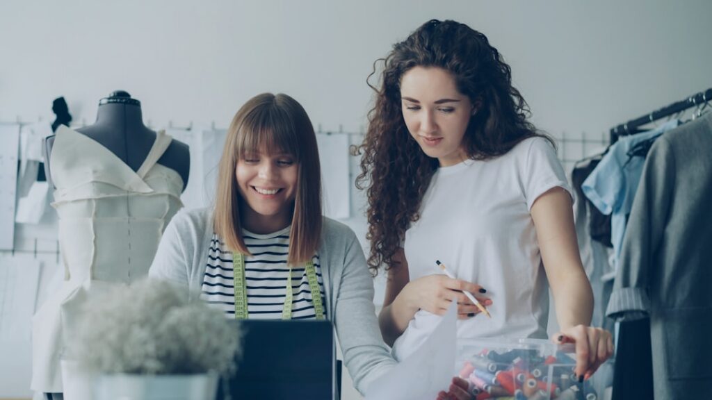 Boutique retail owner packing customer orders in a small shop