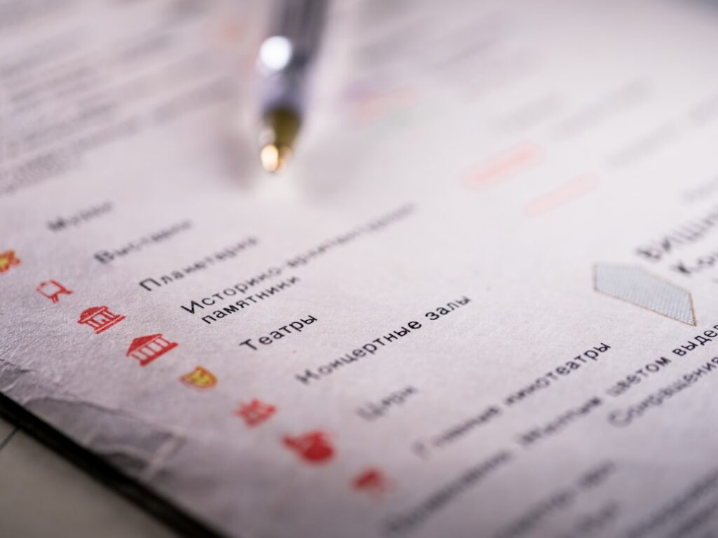 A business financing contract and pen on a desk