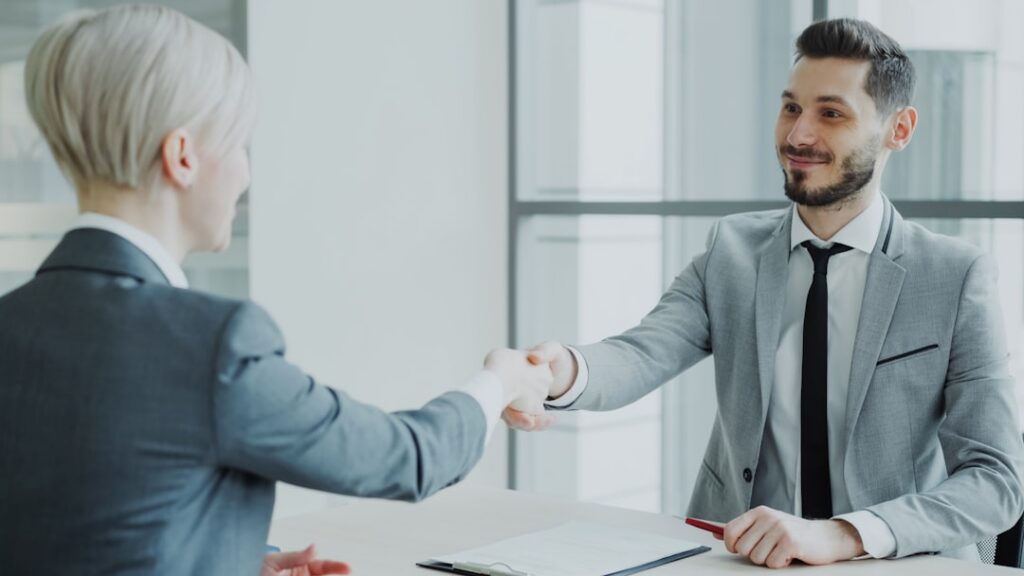 Business owner meeting with an advisor to discuss debt settlement options