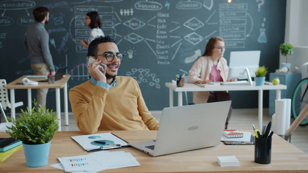 Business owner on the phone discussing next steps with an advisor