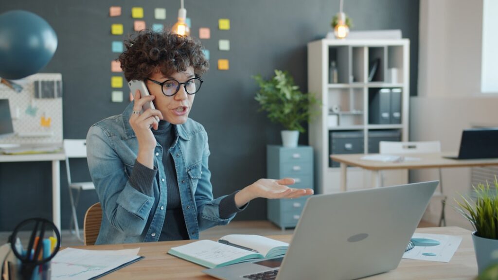 Small business owner on a phone call discussing next steps
