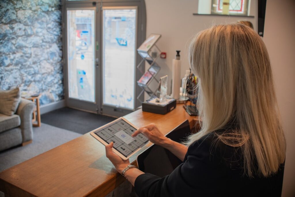 Small business owner reviewing the fine print of a merchant cash advance contract