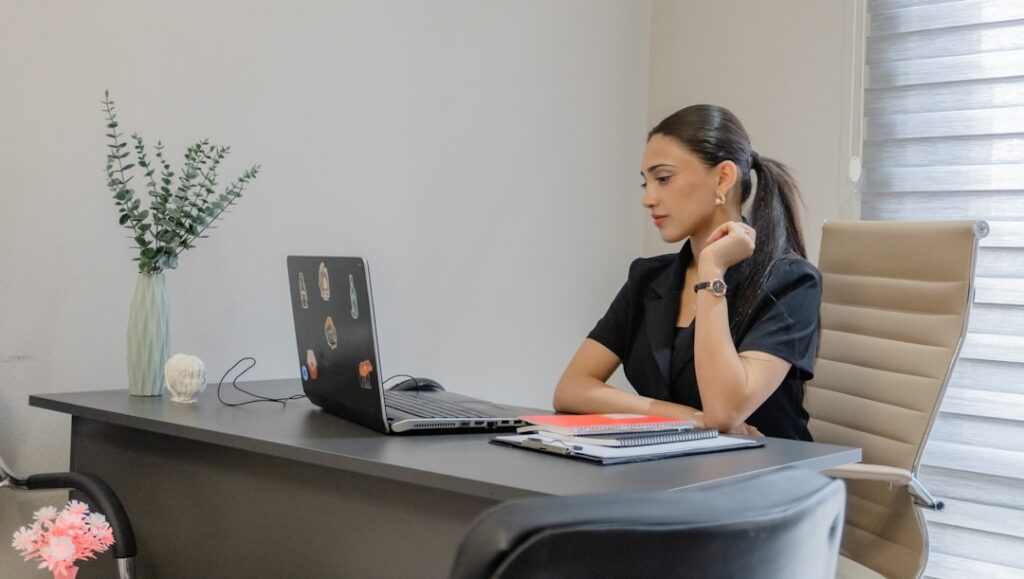 Pharmacy owner on a phone call, working through a debt resolution plan