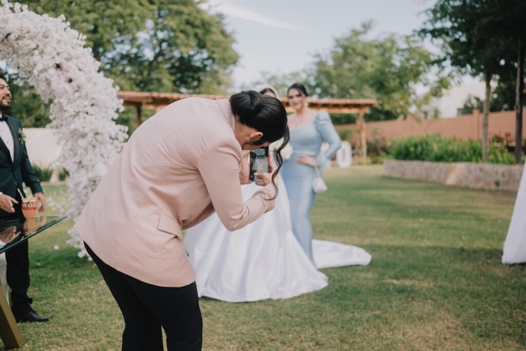 Wedding photographer packing up camera equipment after a shoot