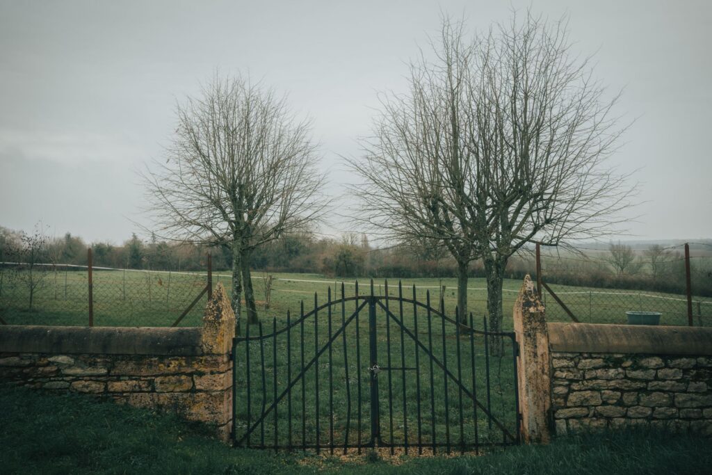 Closed gate at a fall farm stand attraction after the season has ended