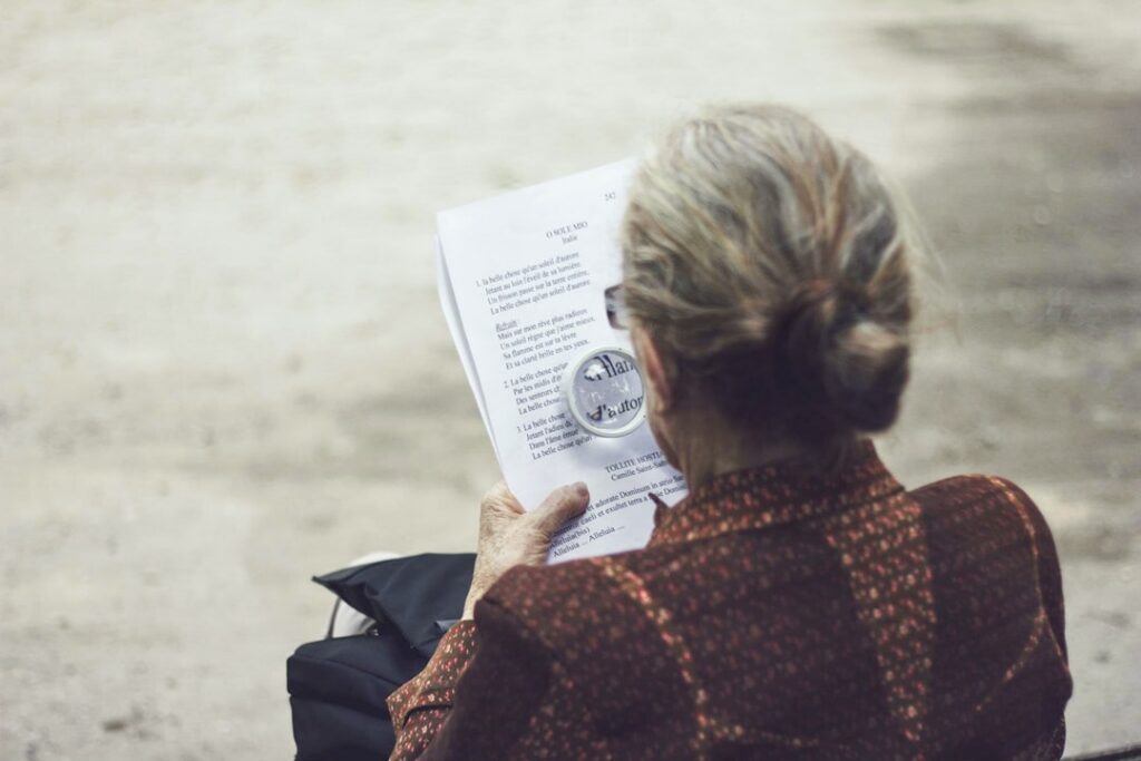 Small business owner closely reading the fine print of a financing contract