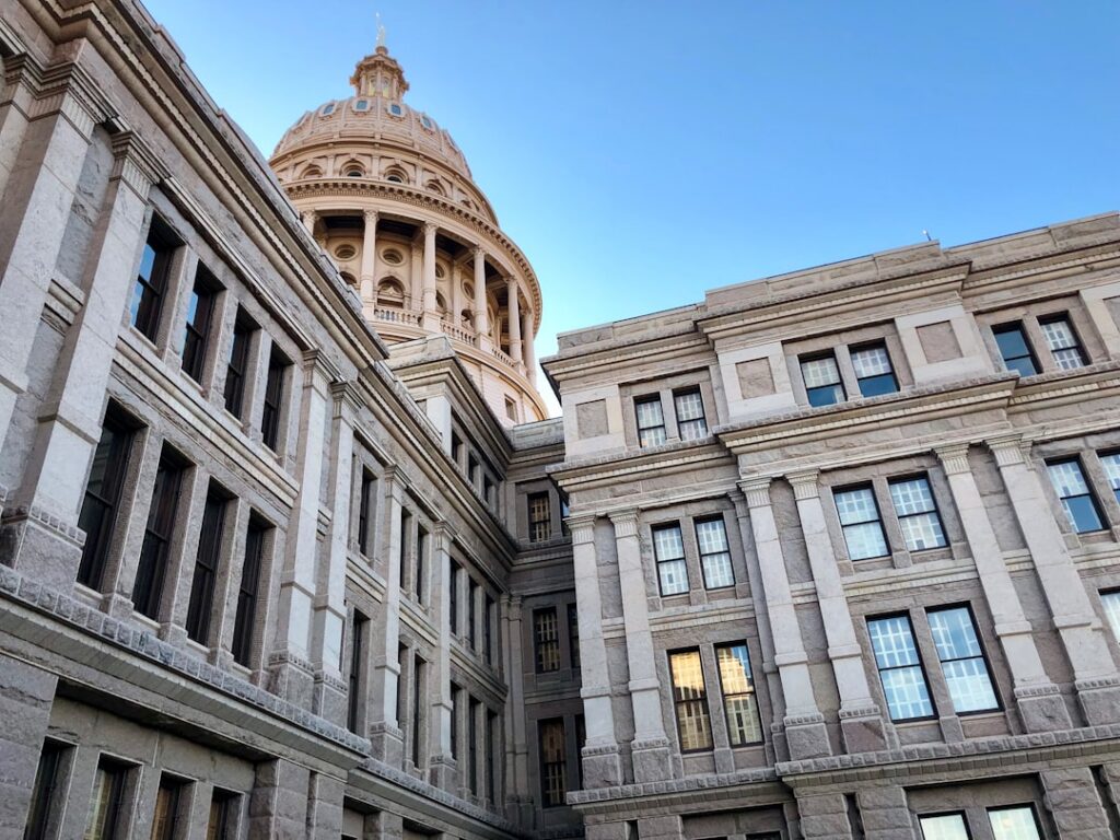 Government regulatory building representing commercial financing disclosure oversight