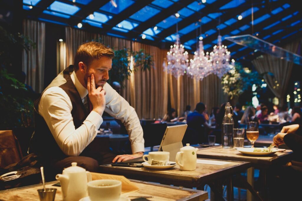 Restaurant owner reviewing bank statements and financing documents