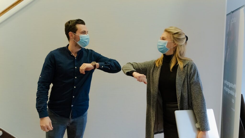 Business owner shaking hands with an advisor after a meeting