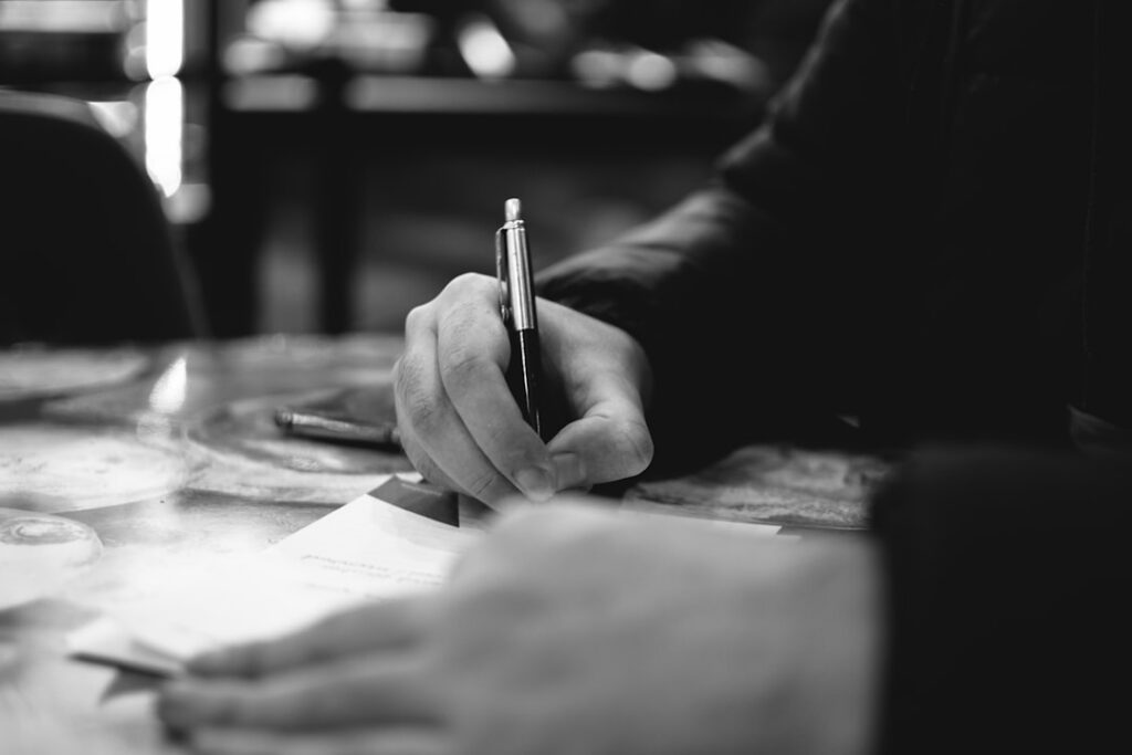 Business owner signing a personal guarantee on a financing contract