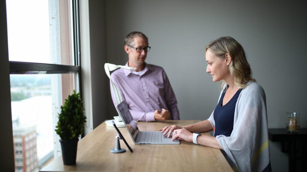 Business owner and advisor shaking hands after a negotiation