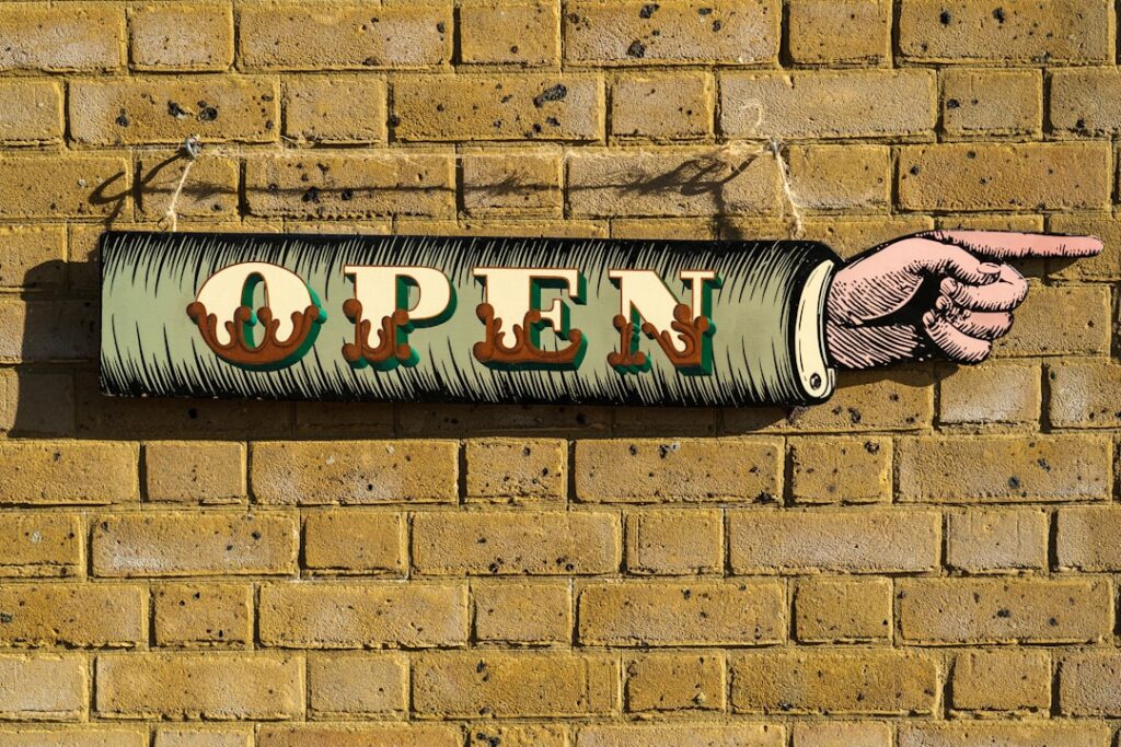 Independent auto repair shop storefront open during summer