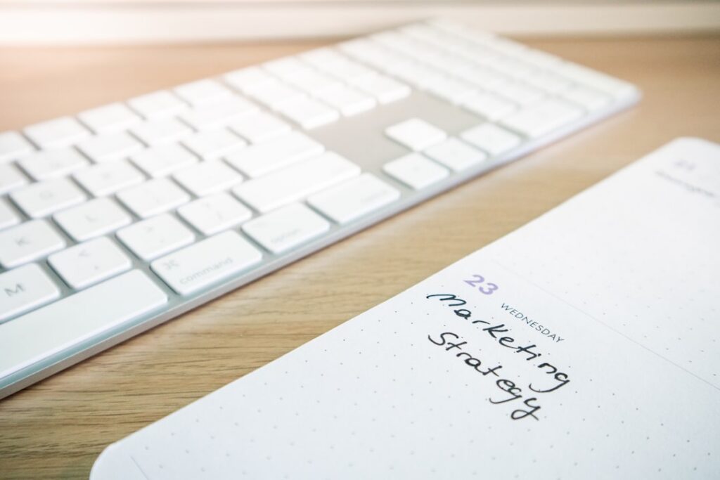 Handwritten checklist prioritizing which bills to pay first