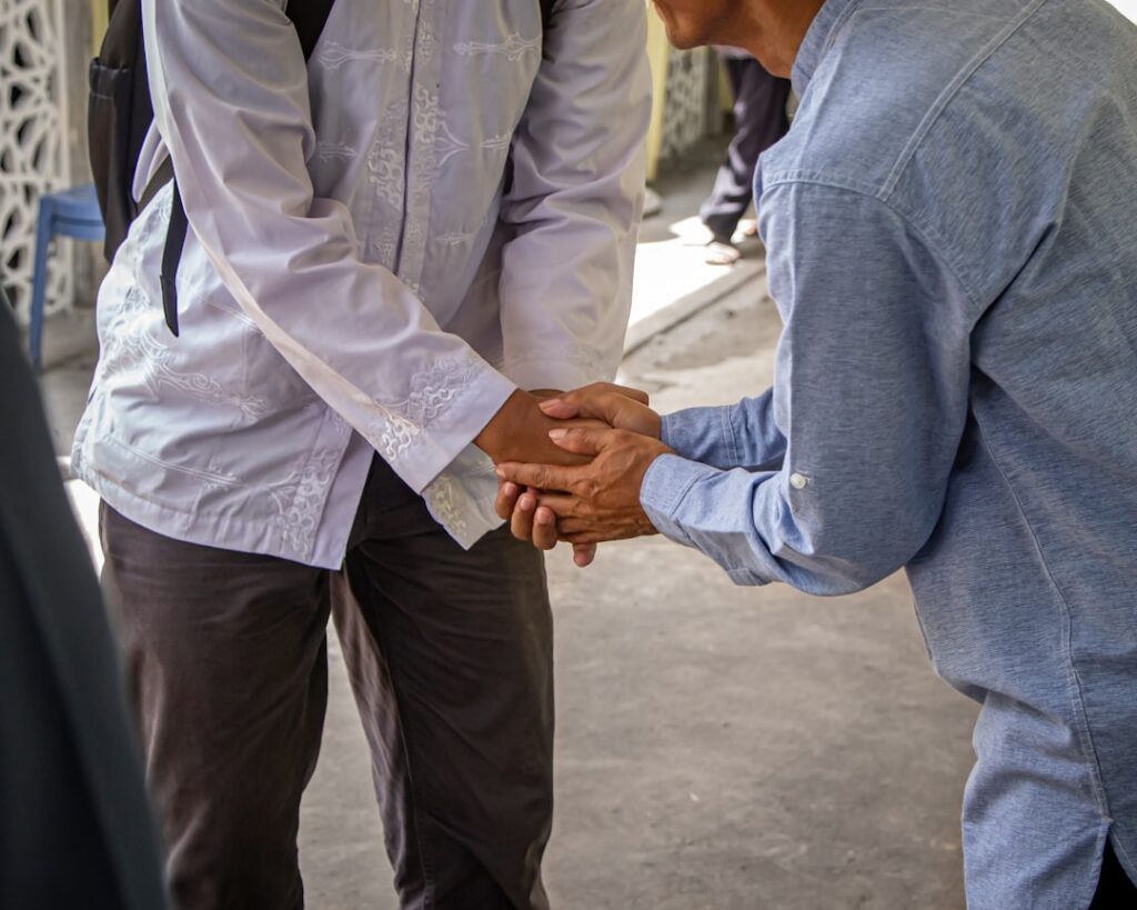 Handshake representing a successfully negotiated debt settlement