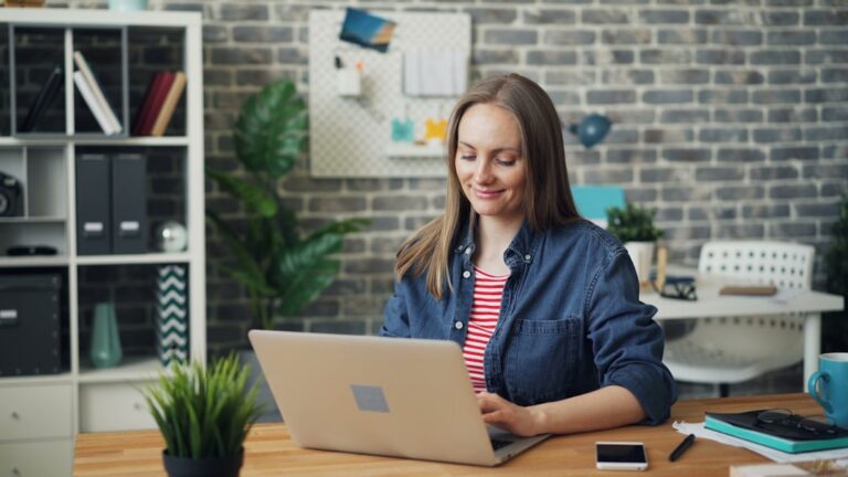 Small business owner calculating a merchant cash advance holdback percentage from a daily sales statement