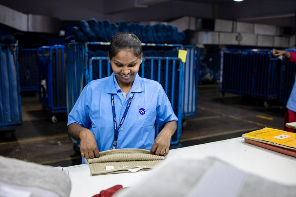 Import business owner reviewing a customs duty invoice in a warehouse