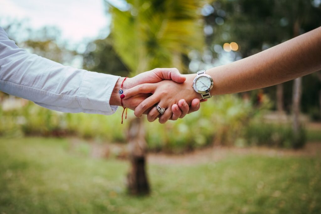 Business owner and specialist finalizing a negotiated settlement