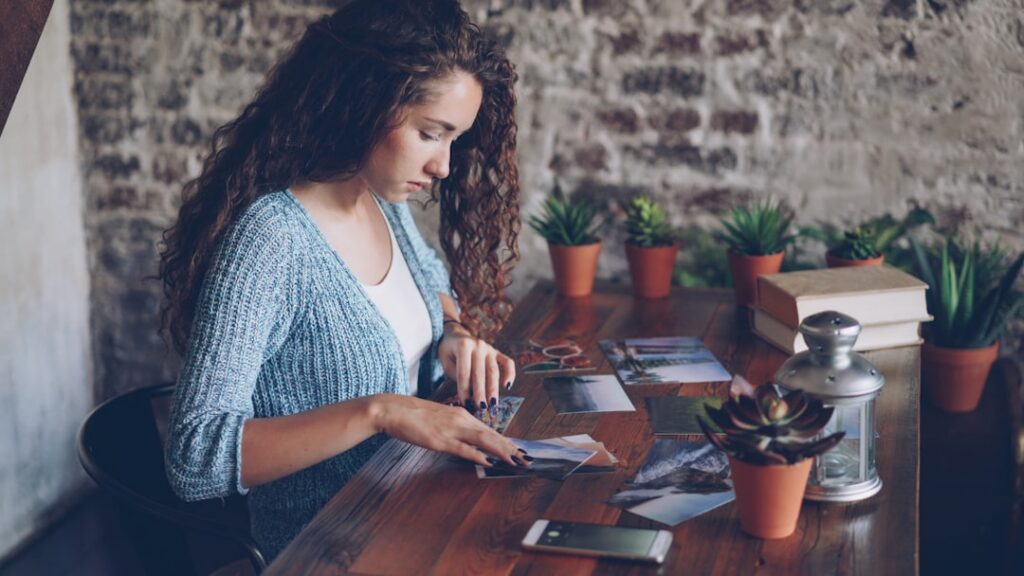 Practice owner reviewing multiple advance statements stacked on a desk