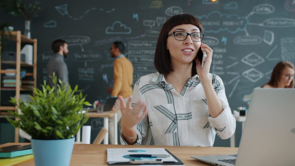 Self-storage facility owner on a phone call discussing next steps