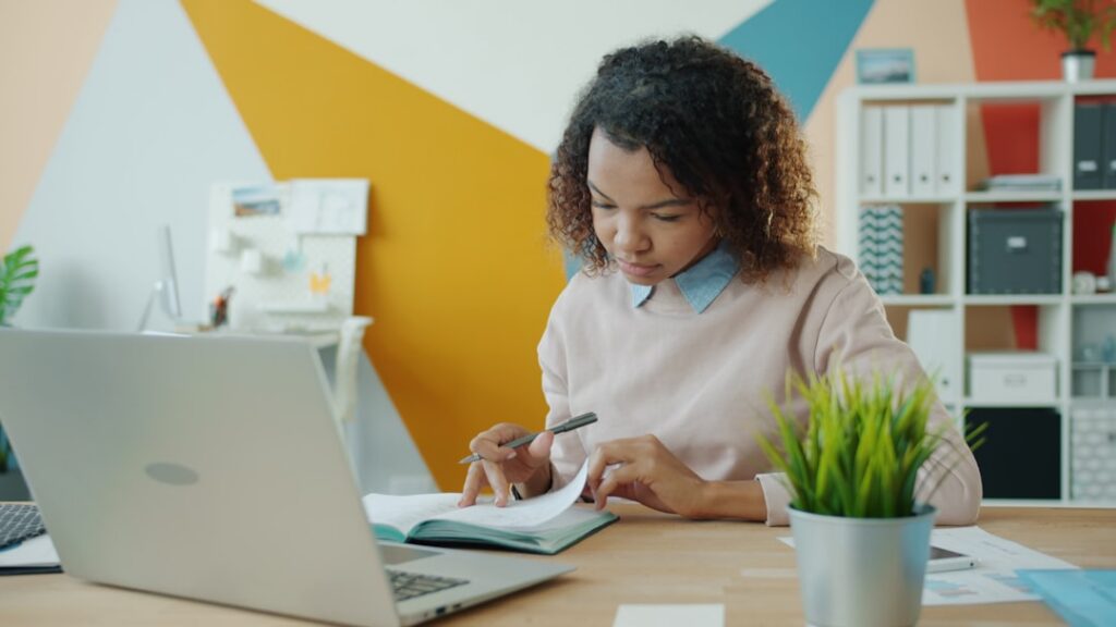 Business owner reviewing a personal guaranty contract at a desk