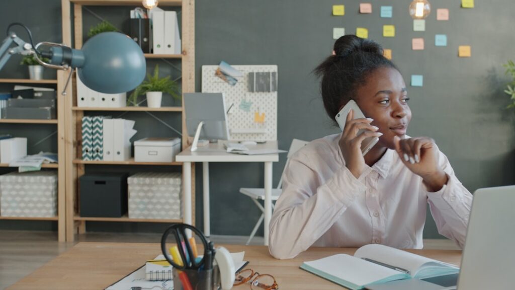 Business owner making a confident phone call from the office