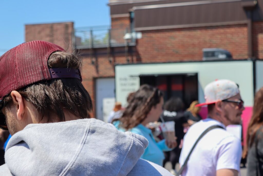 Food truck owner on a phone call discussing next steps outside the truck