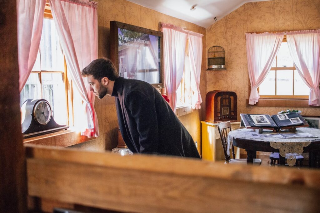 Small business owner reviewing an overdue rent notice at a shop counter