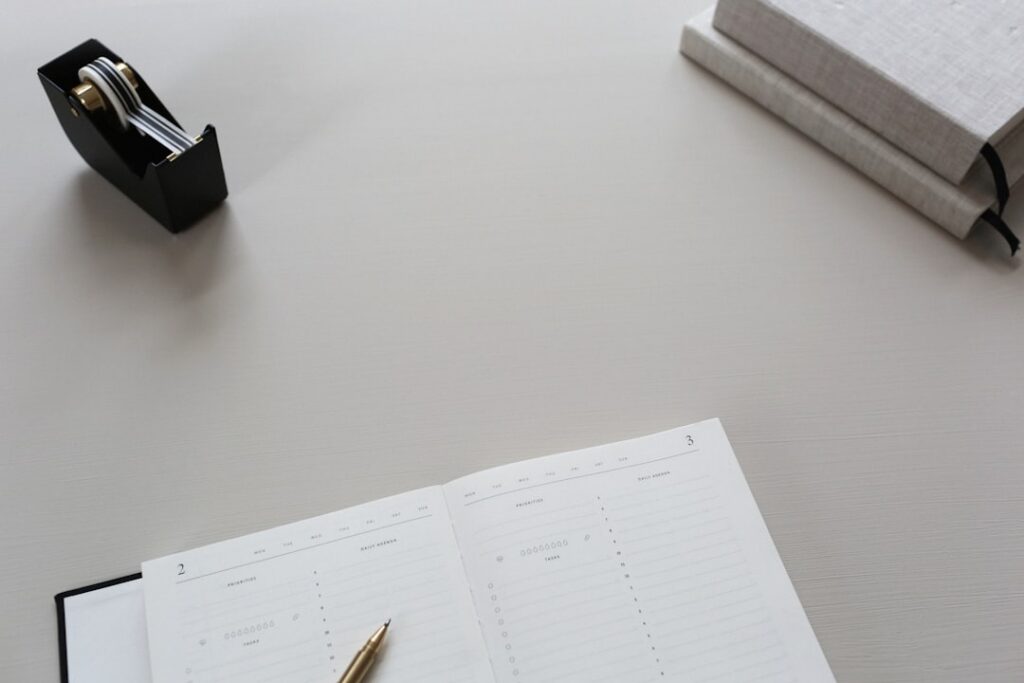 Business contract and pen on a desk, representing an MCA agreement being reviewed