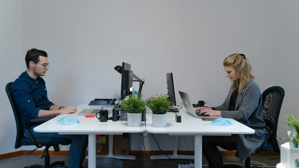 Business owner and advisor shaking hands after reaching an agreement