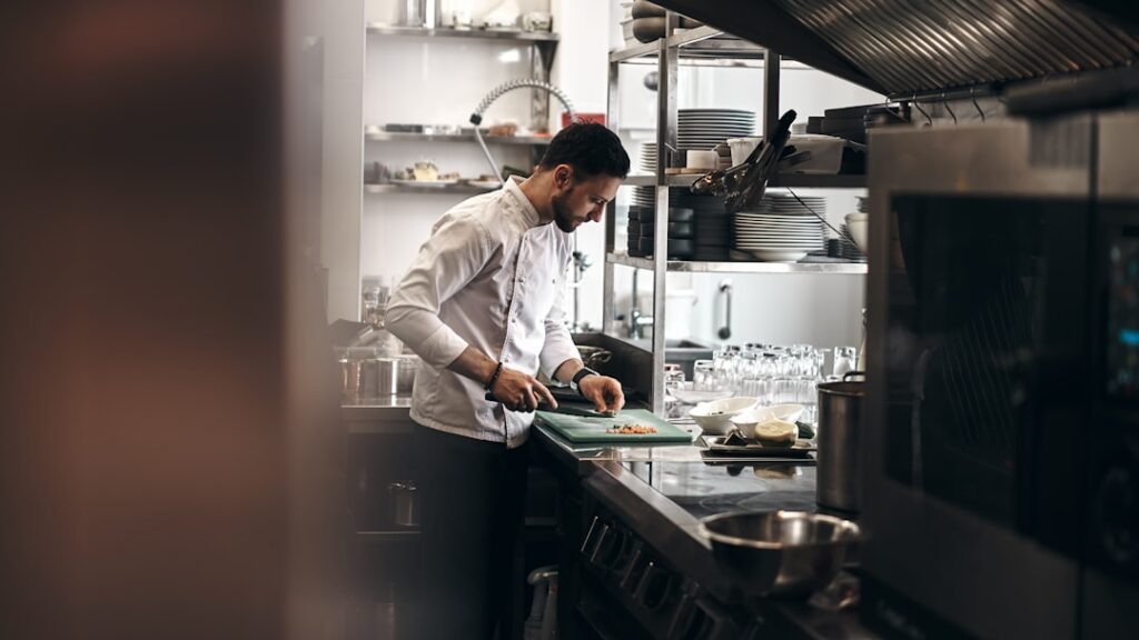 Cooks preparing orders in a delivery-only ghost kitchen