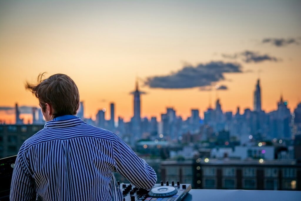 Solar installer reviewing permit paperwork on a rooftop