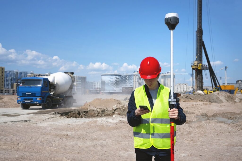 Contractor reviewing a final invoice and punch list at a finished construction site
