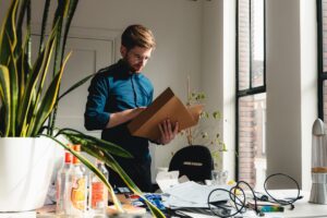 Small business owner reviewing a commercial financing disclosure form at a desk
