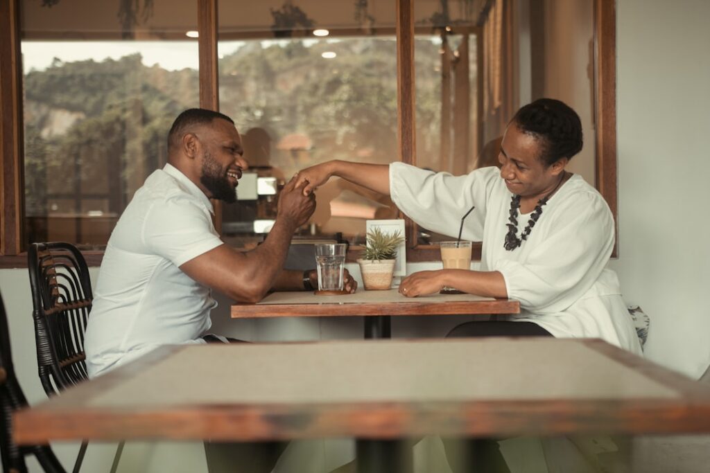 Business owner shaking hands with an advisor after reaching an agreement