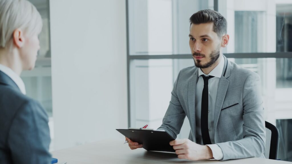 Small business owner conducting a seasonal hiring interview ahead of the holiday rush