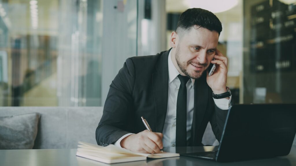 Business owner on a phone call in their office