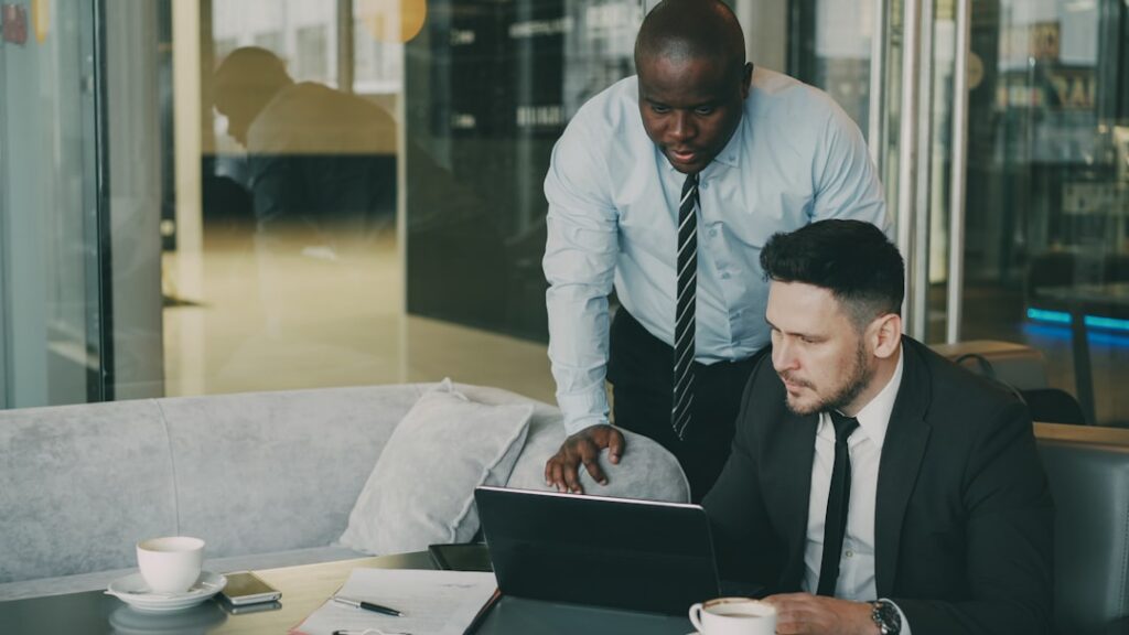 Business owner signing a settlement agreement with an advisor