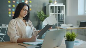 Business owner reviewing a settlement agreement with an attorney