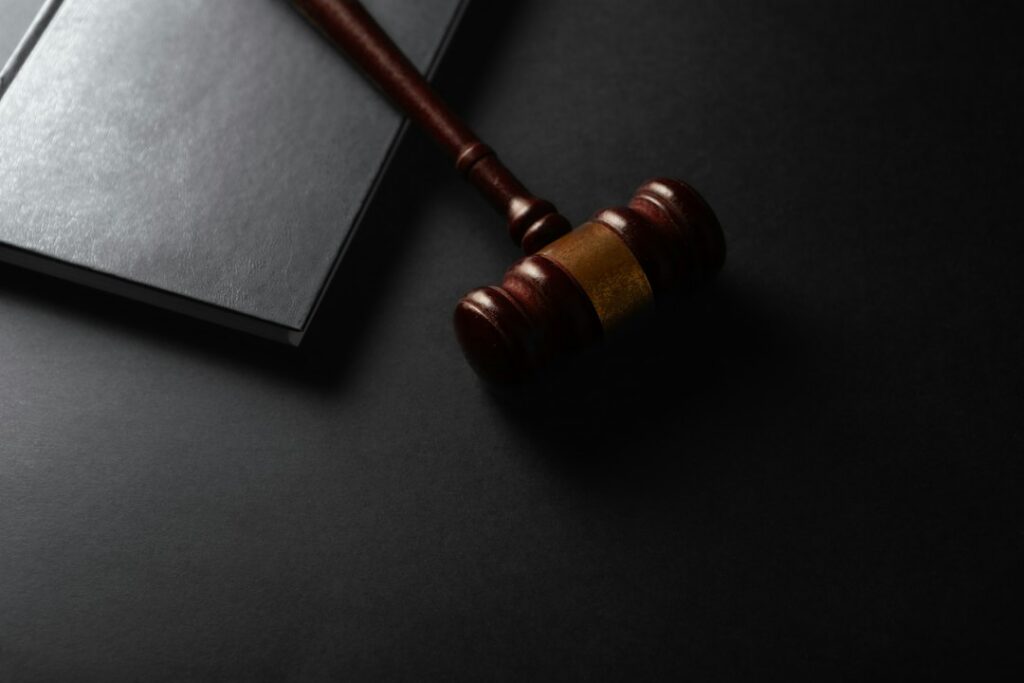 Gavel resting on legal documents representing a business financing contract