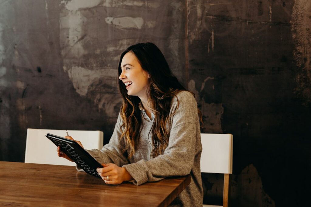 Owner comparing financing options at a table