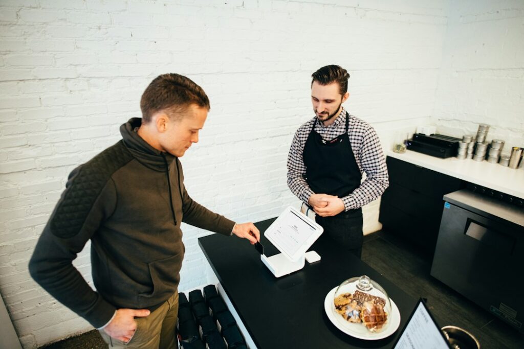 Accountant explaining tax paperwork to a business owner