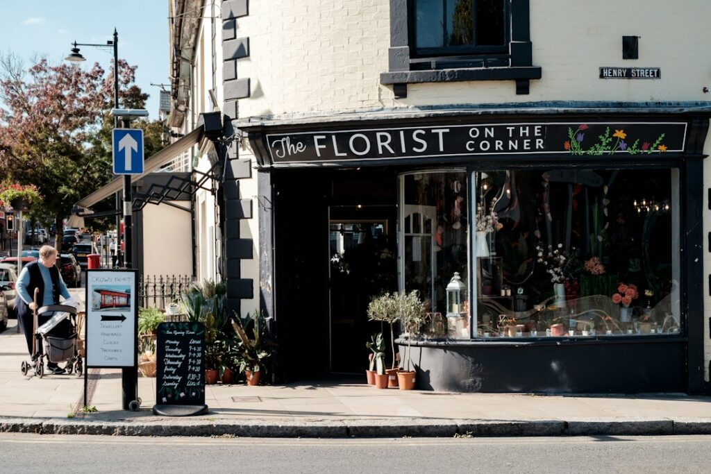 Florist holding a bouquet in a flower shop