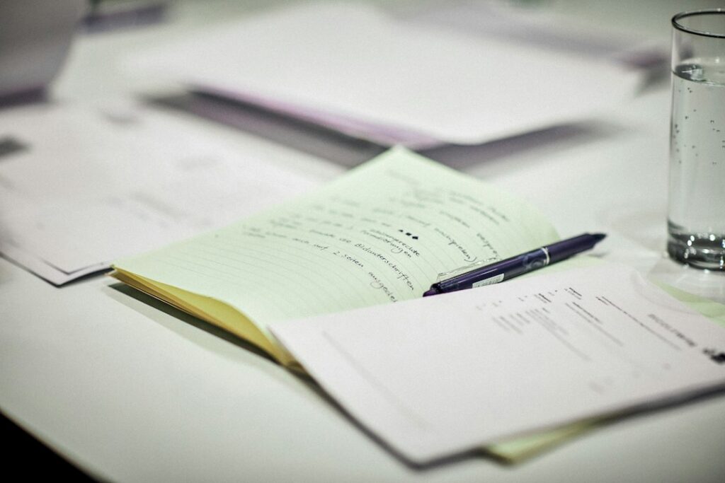 Legal documents and a pen on a desk