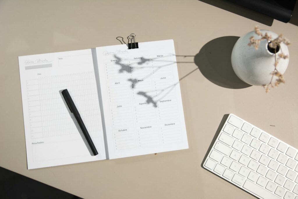 Calendar and payroll papers on a desk