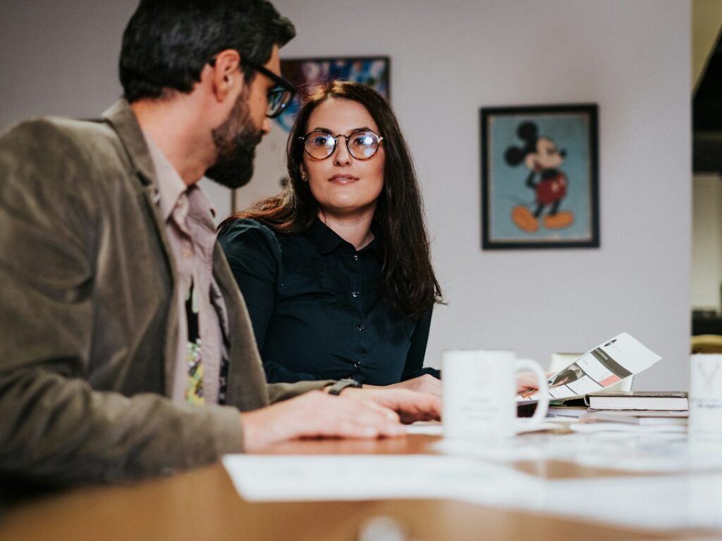 Owner discussing options across a desk